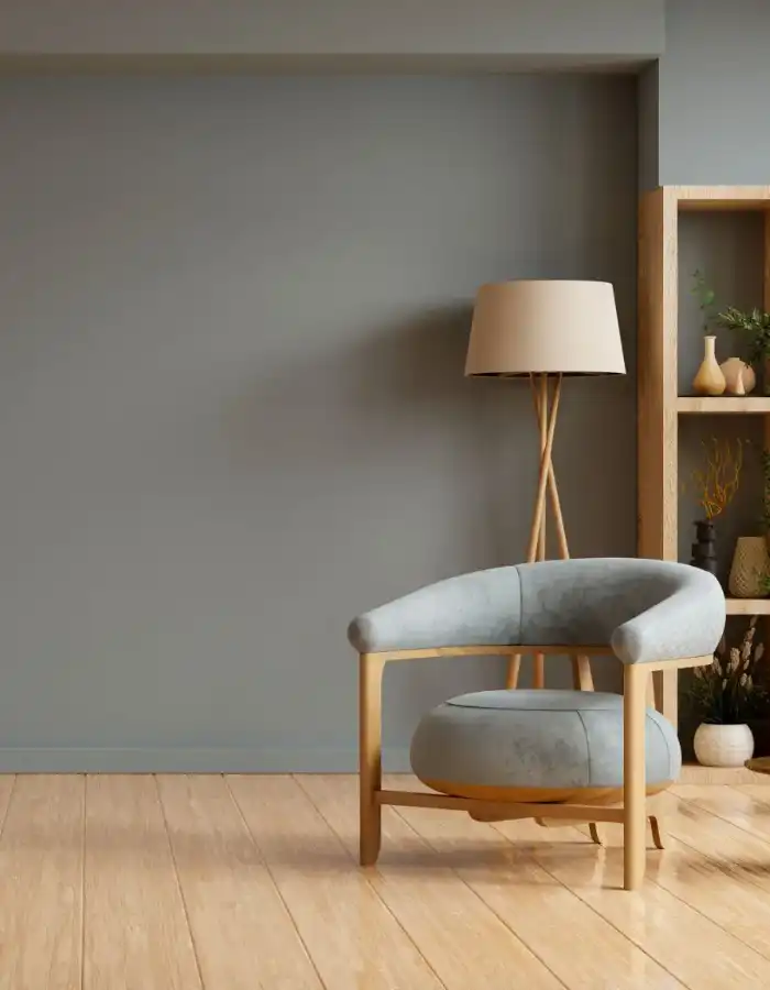 7b70554e-d681-4868-8530-669bc5963943 (1) A chair and lamp in the corner of a room.